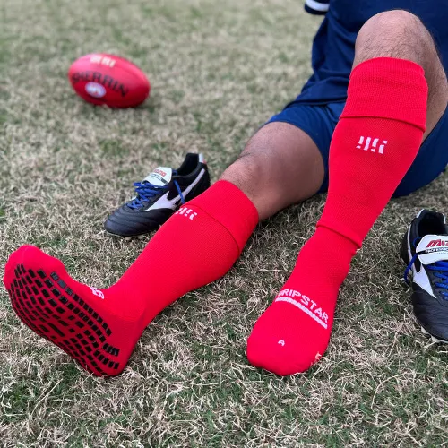 https://shop.sportsclique.com.au/wp-content/uploads/2022/10/grip-star-football-socks-red.webp
